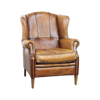 Stoere Cognac-Kleurige Schapenleren Oorfauteuil Met Een Comfortabele Zit En Afgewerkt Met Zwarte