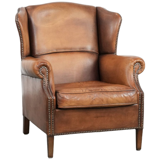 Charmante Schapenleren Oorfauteuil Met Warme Kleuren Afgewerkt Met Siernagels 1