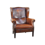 Grote, Zeer Comfortabele Vintage Schapenleren Oorfauteuil Met Een Mooie Diepe Kleurencombinatie thumbnail 1