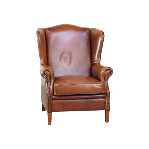 Luxe, Statige, Oorfauteuil Gemaakt Van Rundleer In Een Prachtige Warme Cognac Kleur