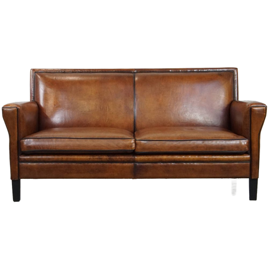 Stijlvolle Schapenleren 2 Zits Art Deco Bank Met Een Afwerking Met Zwarte Biezen 1