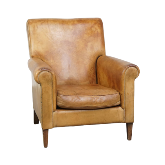 Stijlvolle Gepatineerde Vintage Schapenleren Fauteuil Met Een Comfortabele Zit 1