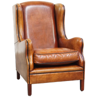 Karaktervolle Schapenleren Oorfauteuil/ Armchair Met Een Tijdloos Design En Zwarte Biezen