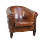 Cognac-kleurige En Comfortabele Vintage Schapenleren Clubfauteuil Met Een Royale Zit thumbnail 1