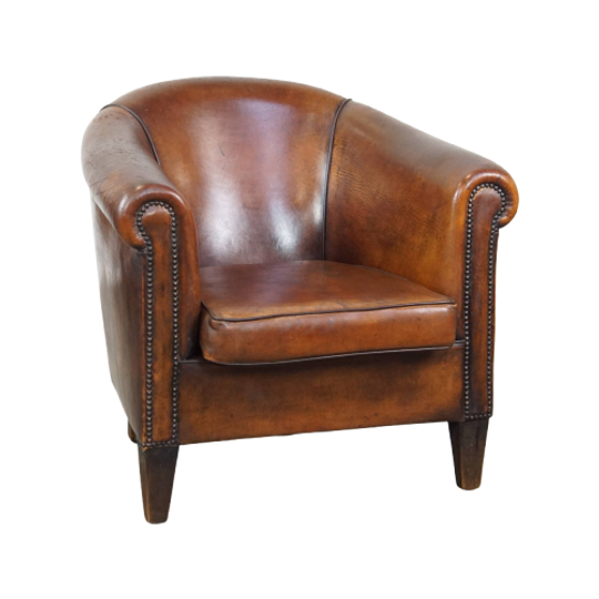 Cognac-kleurige En Comfortabele Vintage Schapenleren Clubfauteuil Met Een Royale Zit 1