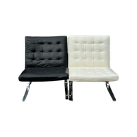Pair Of Barcelona Style Leather Chairs