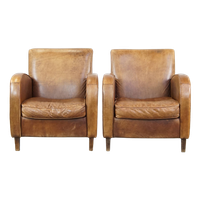 Set Van 2 Comfortabele Cognac-Kleurige Rundleren Armchairs Met Een Strak Design