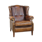 Comfortabele Vintage Schapenleren Oorfauteuil Met Een Tijdloos Design En Een Strakke Afwerking thumbnail 1