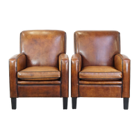 Set Van 2 Karaktervolle, Comfortabele Armchairs Gemaakt Van Schapenleer En Met Een Strak Art Deco