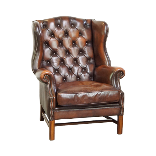 Luxe, Statige, Bruine Rundleren Chesterfield Oorfauteuil Afgewerkt Met Siernagels 1