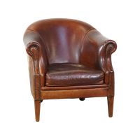 Stoere Maar Comfortabele Clubfauteuil Gemaakt Van Schapenleer En Afgewerkt Met Siernagels