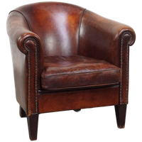 Schapenleren Clubfauteuil In Een Prachtige Warme Cognac Kleur Met Een Mooi Patina