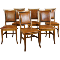 Set Van Zes Schapenleren Eetkamerstoelen Met Een Licht Houten Frame