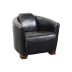 Zwarte Rundleren Fauteuil Met Een Mooie Vormgeving En Een Strak Design thumbnail 1