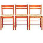 Leuke Set Van 3 Rode Vintage Houten Stoelen Uit De Jaren ’70 Met Een Gevlochten Rieten Zitting thumbnail 1