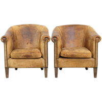 Set Van 2 Geleefde/ Vintage Schapenleren Clubfauteuils Met Een Stoere En Sleetse Uitstraling