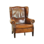 Stoere Schapenleren Oorfauteuil Met Vast Zitkussen En Mooie Warme Cognac Kleuren thumbnail 1