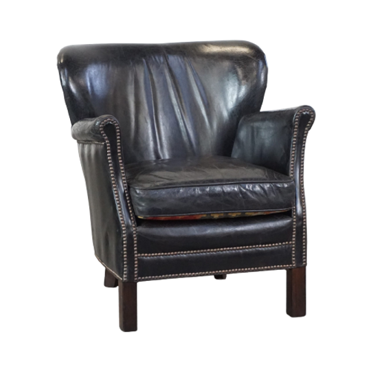 Subtiele Zwarte Fauteuil Met Omkeerbaar Kelim Zitkussen 1