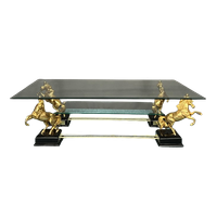 Maison Charles. Salontafel Met Vier Vergulde Bronzen Paarden.
