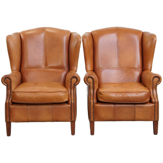 Klassieke En Unieke Set Van 2 Rundleren Oorfauteuils Afgewerkt Met Siernagels En Mooie Details 1