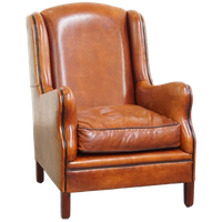 Luxe En Comfortabele Schapenleren Armchair Met Hoge Rug, Zwarte Biezen En Een Tijdloos Design