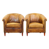 Set Van 2 Comfortabele Vintage Schapenleren Clubfauteuils Met Een Stoere Look