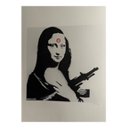 Banksy (1974) - Mona Lisa With Gun thumbnail 1