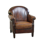 Karaktervolle Fauteuil Gemaakt Van Schapenleer Met Een Geweldig Patina En Goed Zitcomfort thumbnail 1