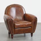 Karaktervolle En Tijdloze Rundleren Design Fauteuil/ Armchair Met Mooie Ronde Vormen En Siernagel thumbnail 9