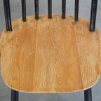 Set Van 4 Vintage Houten Design Stoelen Met Zwarte Spijlen Rugleuning En Bruine Zitting thumbnail 11