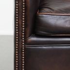 Elegante En Comfortabele Rundleren Clubfauteuil In Engelse Stijl In Een Mooie Donkere Kleur thumbnail 12