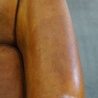 Schapenleren Clubfauteuil In Engelse Stijl Met Karakter En Een Prachtig Patina thumbnail 7