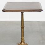 Stijlvolle Antieke Franse Bistro Tafel Met Een Sierlijke Goudkleurige Gietijzeren Poot thumbnail 9