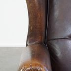 Comfortabele En Stoere Oorfauteuil Gemaakt Van Schapenleer En Strak Afgewerkt Met Zwarte Biezen thumbnail 10