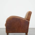 Comfortabele Cognac-Kleurige Rundleren Armchair Met Een Strak Design thumbnail 6