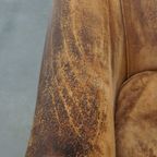 Positief Doorleefde Schapenleren Clubfauteuil Met Een Stoere En Sleetse Vintage Uitstraling thumbnail 7