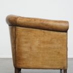 Tijdloze En Stijlvolle Schapenleren Clubfauteuil Met Prachtige Kleuren En Goed Zitcomfort thumbnail 7