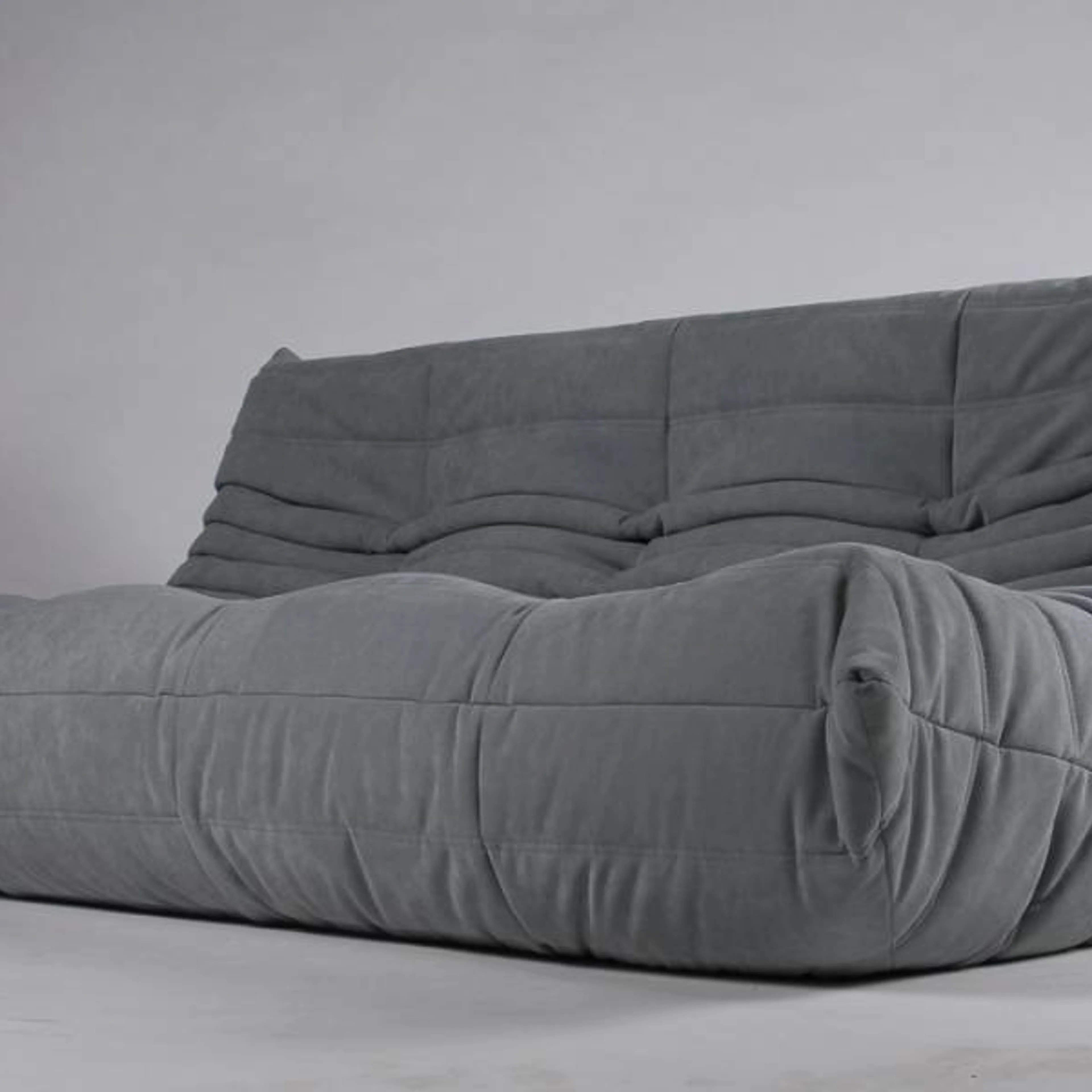 Modern Ligne Roset Togo Textiel Grijs bij Reliving