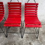 Red Slatted Chair With Black Metal Frame thumbnail 3