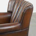 Subtiele, Prachtig Gekleurde Schapenleren Fauteuil Met Een Uniek Design Afgewerkt Met Siernagels thumbnail 13