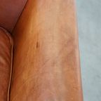 Comfortabele Cognac-kleurige Engelse Rundleren Clubfauteuil Met Een Afwerking Met Siernagels thumbnail 9