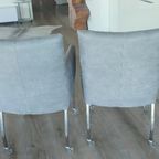 Twee Eetkamer Stoelen Grijs Micro Leder Met Skeet Draai Wieltjes . thumbnail 2