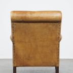 Stijlvolle Gepatineerde Vintage Schapenleren Fauteuil Met Een Comfortabele Zit thumbnail 6