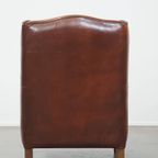 Prachtig Gekleurde, Stoere Vintage Schapenleren Fauteuil Met Een Hoge Rug En Afgewerkt Met Zwarte thumbnail 2