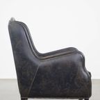 Stoere, Karaktervolle Zwarte Rundleren Fauteuil In Industriële Stijl Met Een Hoge Rug thumbnail 9