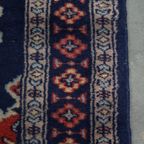 Subtiel Vloerkleed Met Voornamelijk Donkerblauw Gemaakt Van Wol 139x66cm thumbnail 9