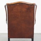 Grote En Luxe Schapenleren Oorfauteuil Met Een Prachtige Warme Kleurstelling thumbnail 4