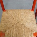 Leuke Set Van 2 Rode Vintage Houten Stoelen Uit De Jaren ’70 Met Een Gevlochten Rieten Zitting thumbnail 5