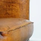 Subtiele, Cognac-kleurige Schapenleren Clubfauteuil Met Een Tijdloos Design En Correct Afgewerkt thumbnail 13