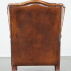 Karaktervolle, Comfortabele Schapenleren Oorfauteuil Met Prachtige Warme Kleuren En Een Stoere Ui thumbnail 5